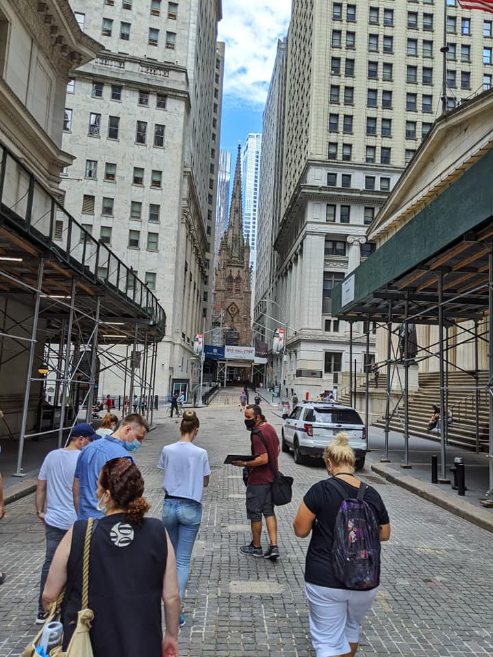 Slava leading a group through Wall Street on a tour of Colonial history