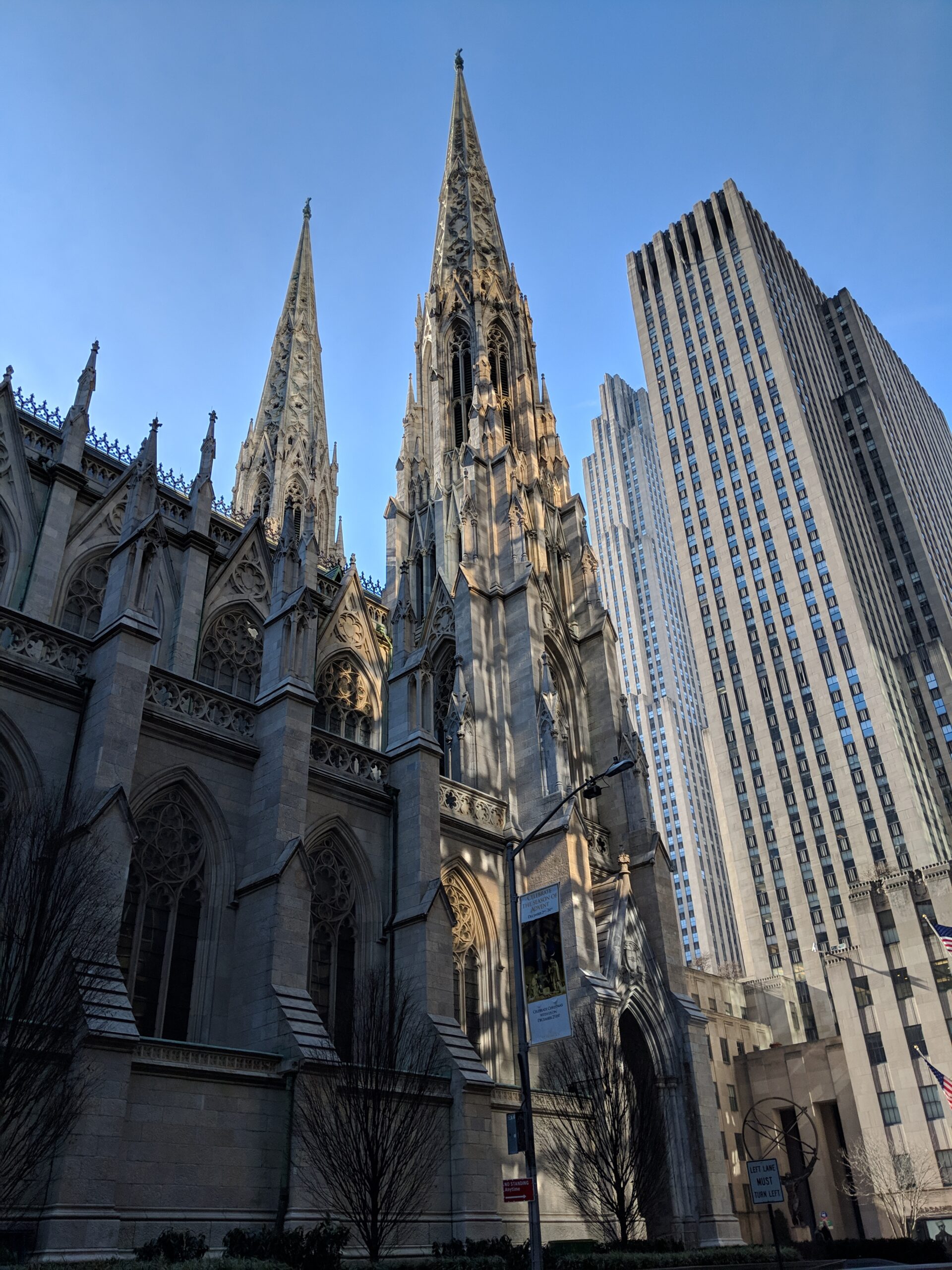 St Patrick's Cathedral from behind with Rockefeller Center on the background and to the right