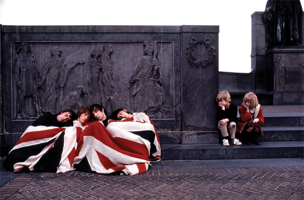 people sleeping under british flag