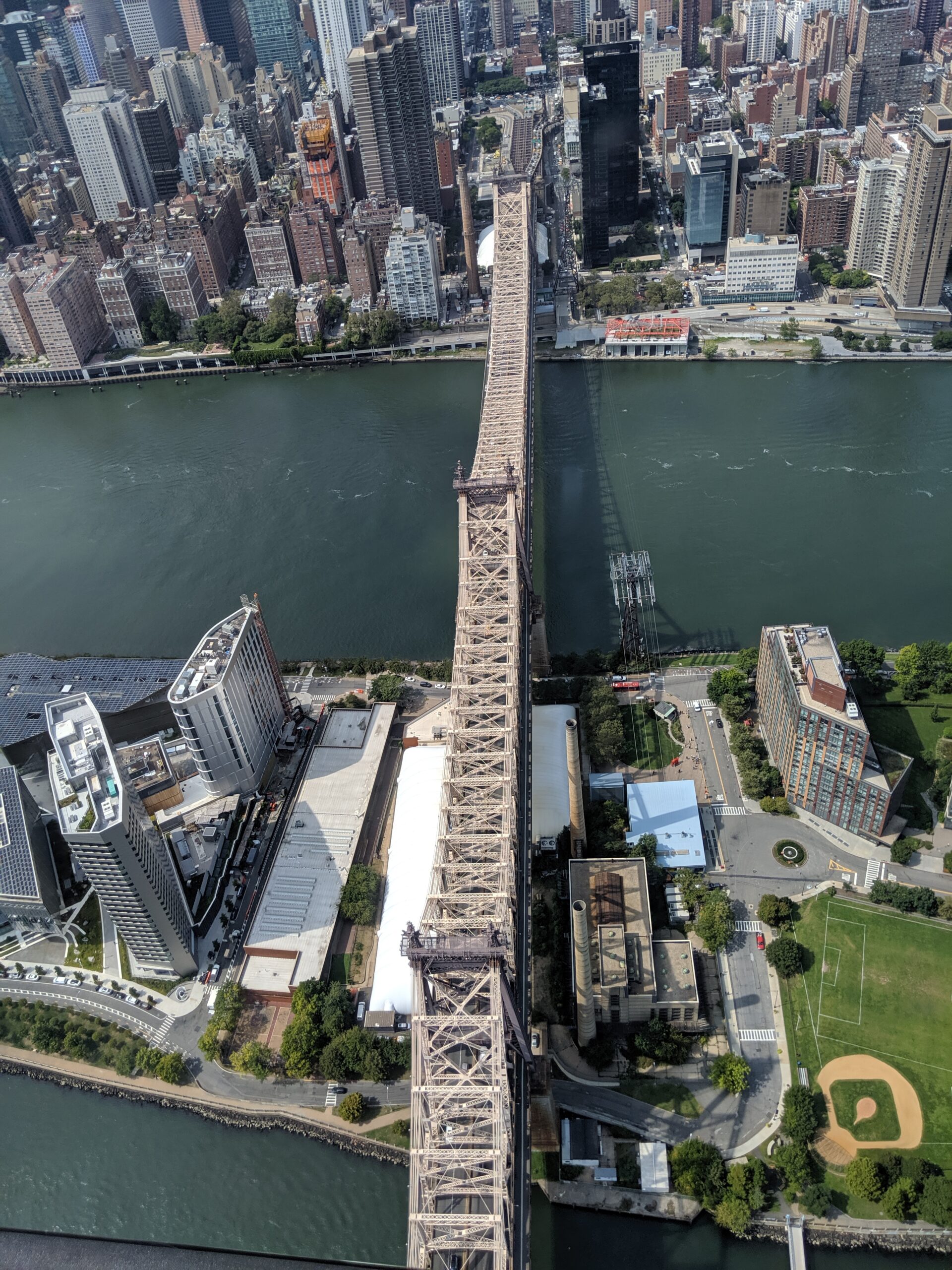 the view of queensboro bridge, roosevelt island and part of midtown Manhattan from the helicopter