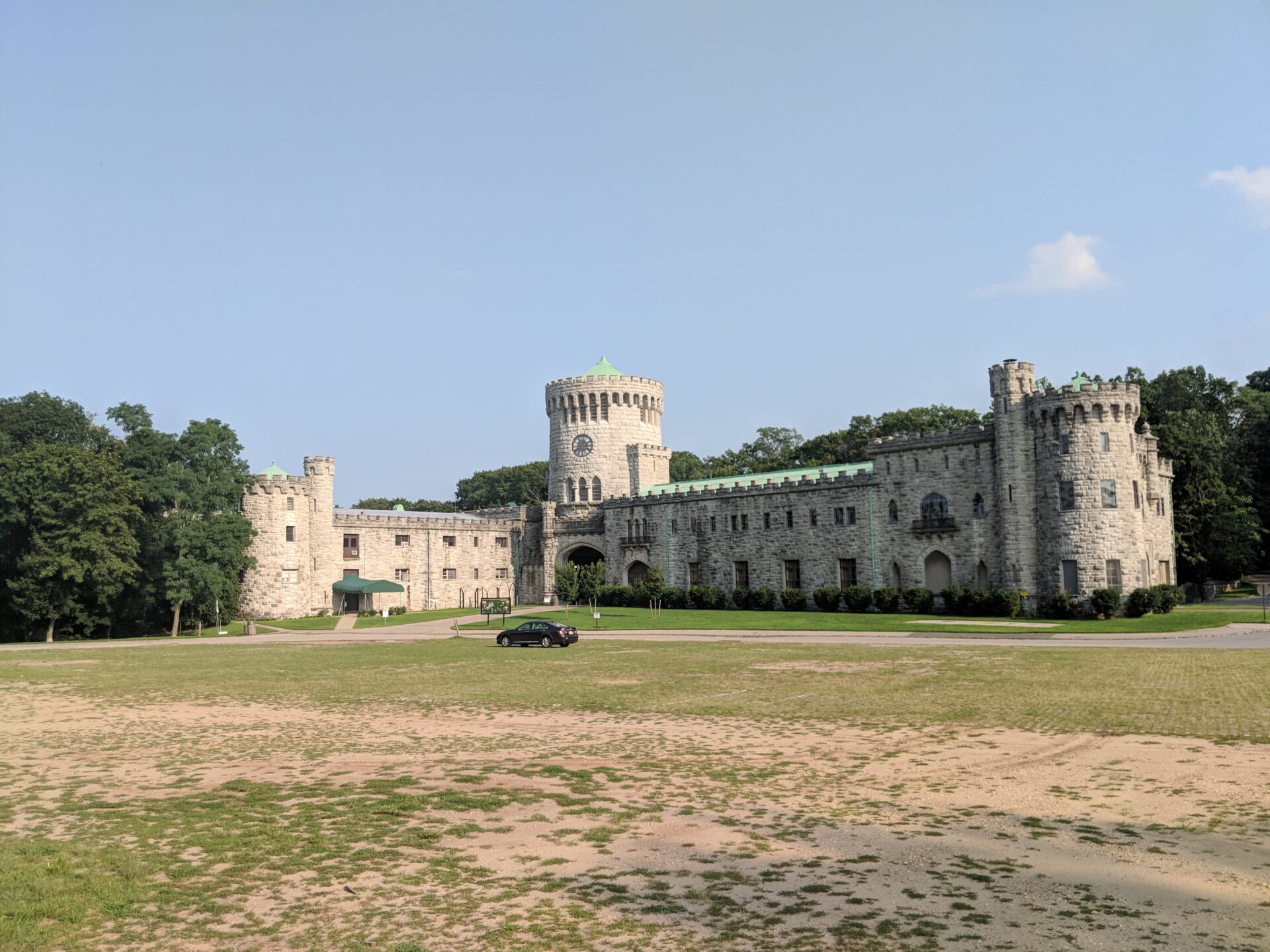 a castle with parking in front